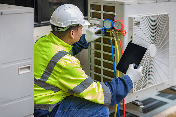 Professional Air Duct Cleaning technician working in Adell, WI